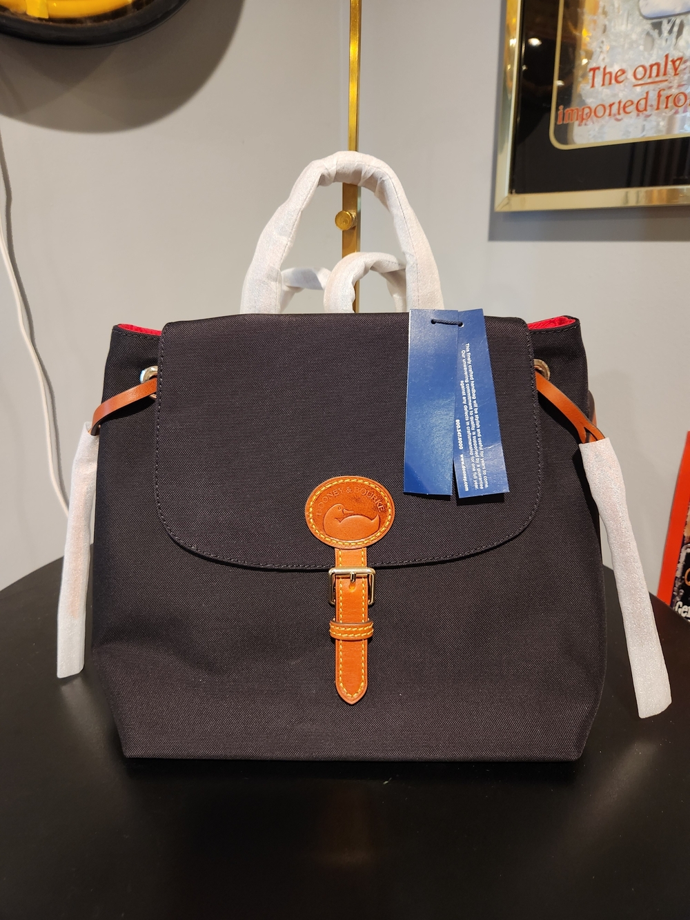 Dooney & Bourke Black Canvas Backpack with Tan Leather Trim